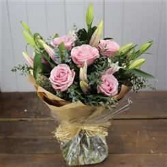 An Oriental Lily and Pink Rose Bouquet